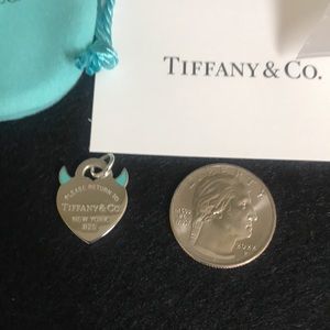 Tiffany & Co. SS Return to Tiffany w “devil” horns